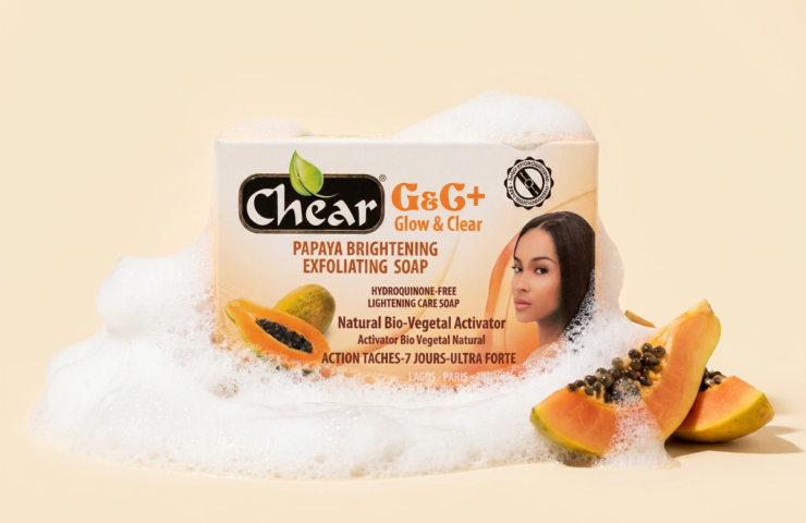 Chear Papaya Brightening Exfoliating Soap in rich cleansing lather with fresh papaya slices